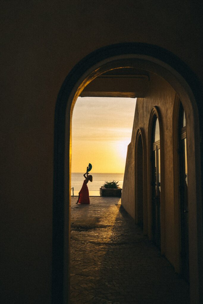A woman dancing in the sunset