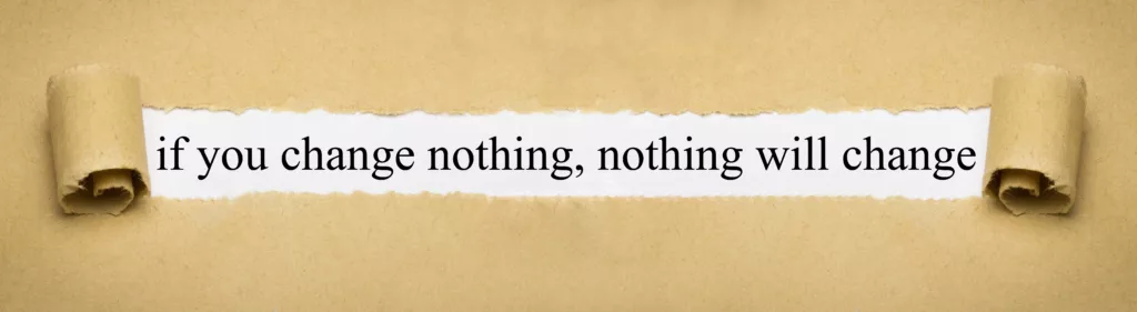 A piece of paper that says "if you change nothing, nothing will change".